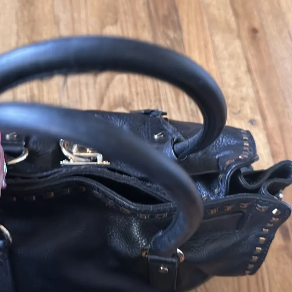 micheal kors black and gold stitched hamilton bag  with lock & key